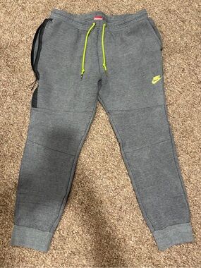 Nike  Tech gray joggers with Neon Accents